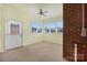 Enclosed porch with neutral paint, carpet, and a ceiling fan at 3951 Jasmine Ln, Denver, NC 28037