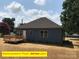 Rear view showcasing a cozy wooden deck, perfect for outdoor entertaining at 408 N Peterson St, Stanley, NC 28164