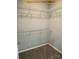 Walk-in closet is equipped with wire shelving and neutral carpeting at 408 N Peterson St, Stanley, NC 28164