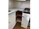 This updated kitchen features granite countertops and smart corner cabinet design at 408 N Peterson St, Stanley, NC 28164