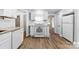 This well lit kitchen features white cabinets and stainless steel appliances, with ample counter space at 430 Sells Rd, Salisbury, NC 28144