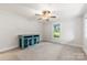 Cozy living room featuring a large window, creating an inviting space at 430 Sells Rd, Salisbury, NC 28144