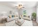Bright living room featuring two sofas and a large window, creating an inviting space at 430 Sells Rd, Salisbury, NC 28144