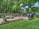 Backyard deck with outdoor seating, grill and a pergola, ideal for entertaining at 4921 Doris Ave, Charlotte, NC 28205
