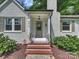 Inviting front entrance with a brick walkway and well-maintained landscaping at 4921 Doris Ave, Charlotte, NC 28205