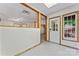 Finished basement entryway with wooden support beams and outdoor access at 5022 Saybrook Dr, Harrisburg, NC 28075