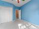 Bright bedroom with a large closet and a view of the staircase to the second floor at 5022 Saybrook Dr, Harrisburg, NC 28075
