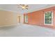 Bright bedroom with ample natural light, walk-in closet and neutral-toned carpet at 5022 Saybrook Dr, Harrisburg, NC 28075