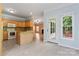 Bright kitchen with eat-in island, stainless appliances, and access to the deck at 5022 Saybrook Dr, Harrisburg, NC 28075