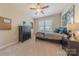 Inviting bedroom with neutral tones, ceiling fan and natural light at 5128 Oakhaven Ln, Fort Mill, SC 29708