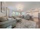 Expansive living room showcasing the open layout leading to the kitchen and dining area at 5128 Oakhaven Ln, Fort Mill, SC 29708