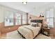 Cozy bedroom with modern decor, unique wall accents, and soft, natural light at 518 Lockwood Creek Dr # 32, Charlotte, NC 28208