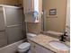 Bathroom with a single sink vanity featuring granite counters, a framed mirror, and a tub with shower at 5908 Tanson Trl, Marshville, NC 28103