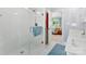 Bright bathroom with glass shower, vanity with sink and door to the main bedroom at 6599 Majestic Pine Dr, Vale, NC 28168
