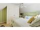 Shared bedroom featuring twin beds, natural lighting, and built in desk at 6599 Majestic Pine Dr, Vale, NC 28168