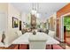 Stylish dining area offering an open layout and scenic views of the living room at 6599 Majestic Pine Dr, Vale, NC 28168