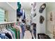 Organized walk-in closet featuring ample shelving and hanging space for clothes and accessories at 6599 Majestic Pine Dr, Vale, NC 28168