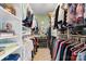 Organized walk-in closet with shelving, hanging rods, and plenty of storage space at 6599 Majestic Pine Dr, Vale, NC 28168