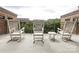 Serene balcony with rocking chairs, perfect for enjoying the outdoors at 721 Governor Morrison St # 520, Charlotte, NC 28211