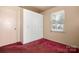 Bedroom featuring closet with built-in storage and a window providing natural light at 728 Dedmon Dr, Charlotte, NC 28216