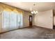 View of the front living room showing the entry and window details at 728 Dedmon Dr, Charlotte, NC 28216