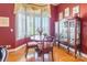 Charming dining area with bay window and decorative display cabinet at 803 Lake Club Dr, Rock Hill, SC 29732
