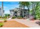 Beautiful lakefront condo with multiple balconies and lush landscaping at 803 Lake Club Dr, Rock Hill, SC 29732