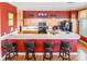 Open kitchen featuring bar seating, wood cabinets, and modern appliances at 803 Lake Club Dr, Rock Hill, SC 29732
