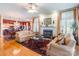 Inviting living room with fireplace, hardwood floors, and elegant furnishings at 803 Lake Club Dr, Rock Hill, SC 29732