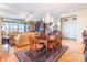 Open concept living and dining area featuring beautiful hardwood floors and lake views at 803 Lake Club Dr, Rock Hill, SC 29732