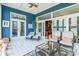 Beautiful sunroom with tile floors, and views of the lake at 803 Lake Club Dr, Rock Hill, SC 29732