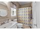 Bathroom featuring a vanity, toilet, and shower with a patterned curtain at 8211 Abbottsgate Ln, Charlotte, NC 28269