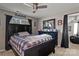 Bedroom boasting dark wood furniture, including a statement bed frame and dresser at 8211 Abbottsgate Ln, Charlotte, NC 28269