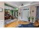 Spacious foyer features hardwood floors, neutral walls, and an inviting view into a study area at 8211 Abbottsgate Ln, Charlotte, NC 28269