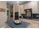 Well-equipped kitchen with black appliances, ample cabinetry, and a kitchen island at 8211 Abbottsgate Ln, Charlotte, NC 28269