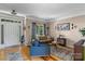 Cozy living room boasts hardwood floors, natural light and a warm, inviting atmosphere at 8211 Abbottsgate Ln, Charlotte, NC 28269