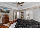 Spacious main bedroom with hardwood flooring and en suite bath and closet access at 8211 Abbottsgate Ln, Charlotte, NC 28269