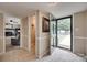 Inviting foyer with tile flooring, neutral paint, and views into the living spaces at 8525 Castlekeep Rd # 26, Charlotte, NC 28226