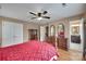 Spacious primary bedroom with hardwood floors, closet, and en-suite bathroom at 8525 Castlekeep Rd # 26, Charlotte, NC 28226