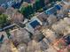 Aerial view showcasing the property's location in a peaceful residential neighborhood at 8532 Westmoreland Lake Dr, Cornelius, NC 28031