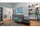 Bedroom with a gray crib, world map, and built-in bookcase for a cozy atmosphere at 8532 Westmoreland Lake Dr, Cornelius, NC 28031