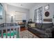 Versatile Bedroom with a crib, sofa, and workspace, providing functionality and style for a growing Gathering at 8532 Westmoreland Lake Dr, Cornelius, NC 28031