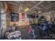 Garage with workout equipment and weightlifting accessories at 8532 Westmoreland Lake Dr, Cornelius, NC 28031