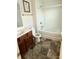 Well-maintained bathroom features a tiled floor and shower-tub combination at 9340 Grand Valley Dr, Charlotte, NC 28213