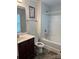 A well-maintained bathroom features modern fixtures, a shower, and a bath at 9340 Grand Valley Dr, Charlotte, NC 28213