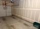 Spacious garage with an automatic door and ample storage space at 9340 Grand Valley Dr, Charlotte, NC 28213