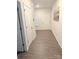 Inviting hallway with durable wood-look flooring and neutral paint creates a welcoming entrance at 9340 Grand Valley Dr, Charlotte, NC 28213