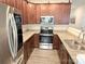 Modern kitchen with granite counters, stainless appliances and ample storage, great for cooking and entertaining at 9340 Grand Valley Dr, Charlotte, NC 28213