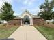 Attractive brick pool house with white columns and gated entrance at 9340 Grand Valley Dr, Charlotte, NC 28213