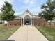 Attractive brick pool house with white columns and gated entrance at 9340 Grand Valley Dr, Charlotte, NC 28213